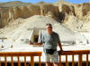 in the Valley of the Kings - standing in front of the entrance to a pharoe's tomb