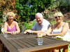 relaxing with a cool drink on Lynne & Ian's decking - well, it seemed like a long walk round Torquay to us  . . . !!after