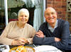 June & John Hierons - sat outside @ 0830 for our toasted Hot Cross Buns